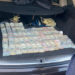 Знайдені у багажнику автівки митника Бурдейного понад 704 тисячі доларів. Джерело: ДБР